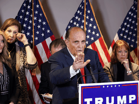 U.S. President Donald Trump's legal team, lead by former New York City Mayor Rudy Giuliani, hold a news conference regarding their efforts to overturn the results of the 2020 U.S. presidential election, in Washington, November 19, 2020.