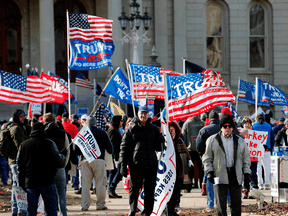 Supporters of U.S. President Donald Trump rally at the Michigan State Capitol on November 14, 2020, in Lansing, Michigan.