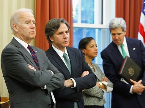 U.S. Vice President Joe Biden, left, and Deputy National Security Advisor Tony Blinken, second from left, stand in the White House in Washington, D.C., in 2013.