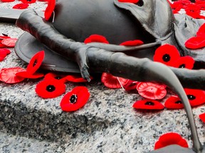 Poppies lie on the Tomb of the Unknown Soldier at the National War Memorial in Ottawa following Remembrance Day ceremonies on Nov. 11, 2019.
