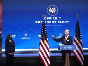 U.S. President-elect Joe Biden delivers remarks about the U.S. economy as U.S. Vice President-elect Kamala Harris looks on during a press briefing at the Queen Theater on November 16, 2020 in Wilmington, Delaware.