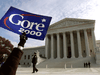 Supporters of Democratic presidential candidate Al Gore protest outside the U.S. Supreme Court which was set to intervene for the first time in an unresolved presidential election in Washington, D.C., December 1, 2000.