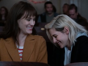 From left, Mackenzie Davis and her bangs, and Kristen Stewart in Happiest Season