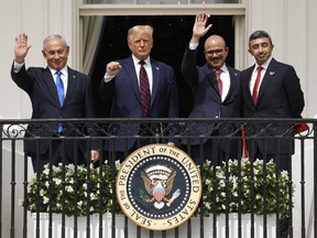 Benjamin Netanyahu, Israel's prime minister, from left, U.S. President Donald Trump, Abdullatif bin Rashid Al Zayani, Bahrain's foreign affairs minister, and Sheikh Abdullah bin Zayed bin Sultan Al Nahyan, United Arab Emirates' foreign affairs minister, during an Abraham Accords signing ceremony event on the South Lawn of the White House in Washington, D.C., U.S., on Tuesday, Sept. 15, 2020.