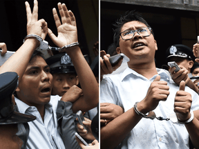 Journalists Kyaw Soe Oo, left, and Wa Lone are escorted by police after their sentencing by a court to jail in Yangon, Myanmar, on September 3, 2018.