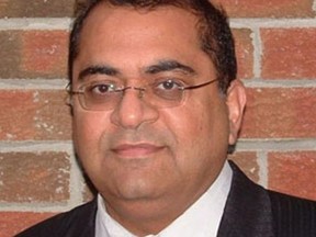 Named as a defendant in the Superior Court claim is Sanjay Madan, who had a senior IT role and helped develop the computer application for applying and approving the benefit.
