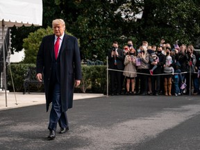 U.S. President Donald Trump walks to speak to the press outside of the White House on October 30, 2020 in Washington, DC.