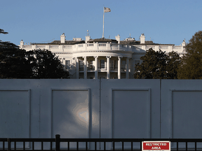 The south side of the White House behind layers of fencing in the event of violence.