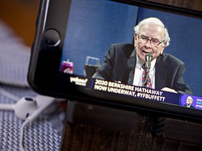 Warren Buffet, chairman and chief executive officer of Berkshire Hathaway Inc., speaks during the virtual Berkshire Hathaway annual shareholders meeting seen on a smartphone in Arlington, Virginia, U.S., on Saturday, May 2, 2020.