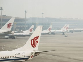This file photo taken on April 6, 2017 shows Air China planes parked at the Beijing Capital International Airport.