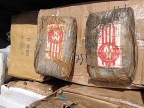 A photo on December 15, 2020 shows a box filled with one-kilo "bricks" of cocaine after a transfer to a police pickup truck from a patrol vessel that transported the cocaine from a remote outer atoll to Majuro for confiscation and destruction