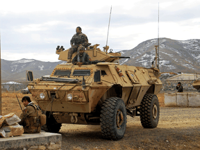 Afghan National Army soldiers keep watch outside of a military compound near Ghazni city, Afghanistan November 29, 2020.