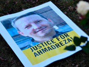 In a file photo taken on Feb. 13, 2017 a flyer is pictured during a protest outside the Iranian embassy in Brussels for Ahmadreza Djalali, an Iranian-Swedish academic detained in Tehran and sentenced to death for espionage. Djalali was transferred to death row on Dec. 1, 2020.