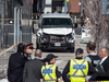 The van driven by Alek Minassian in a deadly rampage sits on a sidewalk in Toronto on Monday, April 24, 2018.