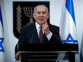 Israeli Prime Minister Benjamin Netanyahu delivers a speech at the Knesset in Jerusalem on December 22, 2020.