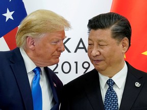 U.S. President Donald Trump, left, meets with Chinese President Xi Jinping at the start of their bilateral meeting at the G20 leaders summit in Osaka, Japan, in 2019.