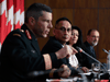 Deputy Chief Public Health Officer Dr. Howard Njoo listens as Maj.-Gen. Dany Fortin, Vice-President of Logistics and Operations at the Public Health Agency of Canada, speaks during a technical briefing on the roll-out of COVID-19 vaccines, in Ottawa, on Thursday, Dec. 3, 2020.