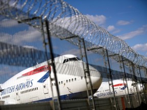 British Airways planes sit on the tarmac at Heathrow Airport in London.