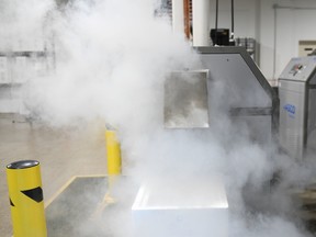 A dry ice pellet machine is pictured at CryoCarb, a dry ice facility that could help supply dry ice to the area to keep the Pfizer coronavirus vaccine cool, in Beloit, Wis., on Dec. 4.