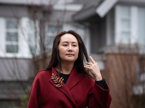 Meng Wanzhou, chief financial officer of Huawei, leaves her Vancouver mansion to attend an extradition hearing at B.C. Supreme Court on Dec. 11, 2020.