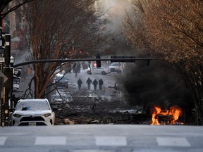 A vehicle burns near the site of an explosion in the area of Second and Commerce in Nashville, Tennessee, U.S. December 25, 2020.