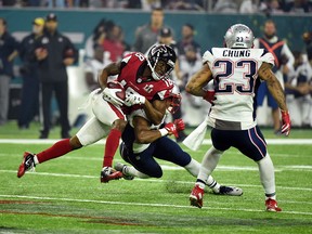 Taylor Gabriel #18 of the Atlanta Falcons makes a run against Eric Rowe #25 of the New England Patriots during the third quarter of the Super Bowl LI at NRG Stadium on Feb. 5, 2017, in Houston, Texas.