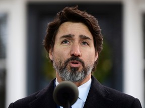 Prime Minister Justin Trudeau holds a press conference outside Rideau Cottage in Ottawa on Dec. 1, 2020.
