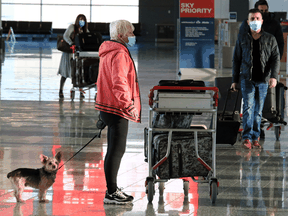 Travellers at Calgary International Airport on Thursday, November 26, 2020.