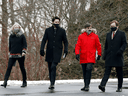 From left, Infrastructure and Communities Minister Catherine McKenna, Prime Minister Justin Trudeau, Canadian Heritage Minister Steven Guilbeault and Environment and Climate Change Minister Jonathan Wilkinson arrive for a news conference in Ottawa on Dec. 11.