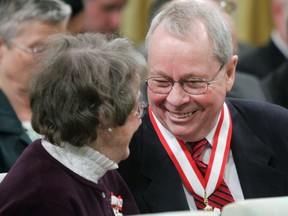 Former Toronto Mayor David Crombie of Toronto, (right) laughs with Budge Wilson of Halifax, N.S. after receiving the Order of Canada during a ceremony at Rideau Hall in Ottawa Friday, March 11, 2005.