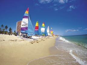 Catamarans await launch on a beach in Ft. Lauderdale, Florida.