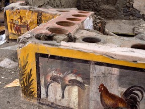 Frescoes on an ancient counter discovered during excavations in Pompeii, Italy.
