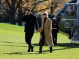 Ivanka Trump and her husband Jared Kushner walk on the South Lawn of the White House upon their return to Washington with U.S. President Donald Trump from Camp David, U.S., November 29, 2020.