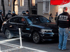 New York Police Department officers surround a car after it struck multiple Black Lives Matter protesters on December 11, 2020 in New York.