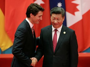 Chinese President Xi Jinping shakes hands with Prime Minister Justin Trudeau during the G20 Summit in Hangzhou, Zhejiang province, China, Sept. 4, 2016.