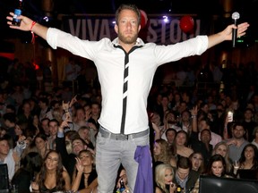 Dave Portnoy, founder of Barstool Sports, stands on stage at the Barstool Party 2017, in Houston, in 2017.