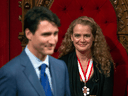 Prime Minister Justin Trudeau walks by Governor General Julie Payette during her installation ceremony in 2017.