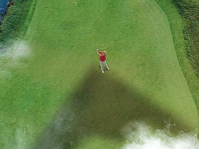 Kahemeni’s Twitter account posted a photo of a golfer — with a striking resemblance to Trump — with the shadow of a drone lurking above him.
