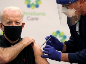 U.S. President-elect Joe Biden receives his second dose of a COVID vaccine at Christiana Hospital in Newark, Del., on Jan. 11, 2021.