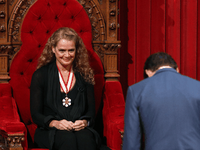 Prime Minister Justin Trudeau bows to the new the Governor general Julie Payette at the Senate in Ottawa, October 2, 2017.