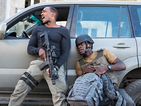 Medic! Script doctor! Anthony Mackie (left) and Damson Idris in Outside the Wire.