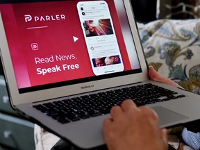 Alphabet Inc's Google on Friday suspended the Parler social networking service from its app store, citing posts inciting violence.