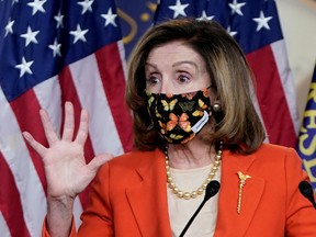 U.S. House Speaker Nancy Pelosi (D-CA) attends her weekly news conference at the U.S. Capitol in Washington, U.S., January 15, 2021.