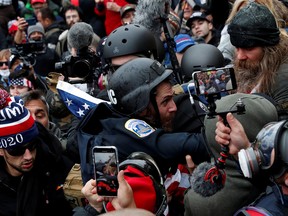 Pro-Trump protesters clash with police in an assault on the U.S. Capitol Building in Washington, D.C., on Jan. 6, 2021.