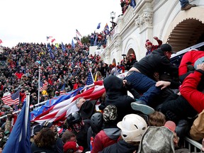 Pro-Trump protesters storm the U.S. Capitol Building to contest the certification of the U.S. presidential election results by the U.S. Congress, on Jan. 6, 2021.