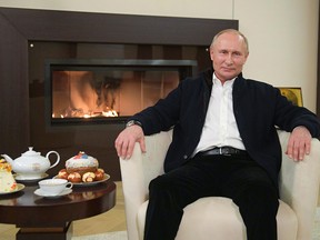 Russian President Vladimir Putin congratulates believers on Orthodox Easter in his residence outside Moscow on April 19, 2020, during a COVID-19 lockdown.