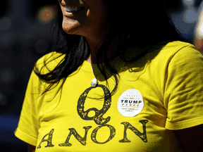 A supporter of U.S. President Donald Trump wears a QAnon shirt in Adairsville, Georgia, September 5, 2020.