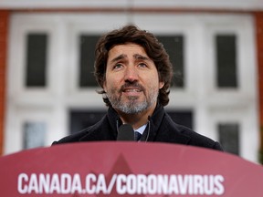 Prime Minister Justin Trudeau speaks about the coronavirus pandemic during a news conference in front of his residence at Rideau Cottage in Ottawa, on Jan. 5, 2021.