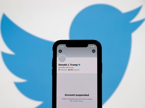 The suspended Twitter account of U.S. President Donald Trump is seen on an iPhone screen on Jan. 8, 2021.