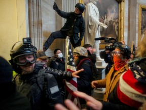 Pro-Trump protesters storm the U.S. Capitol building in Washington, D.C., on Jan 6.